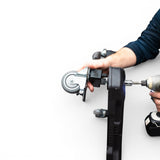 Willey Quick Glideator Caster Upgrade Kit being installed onto a black tool case with a drill. Features wide stance, dual-locking casters.