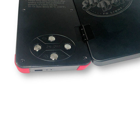 Anson PDR Elimadent X-Factor Flip Light with buttons and red accents. Features warm and cool LEDs with dimmer controls.