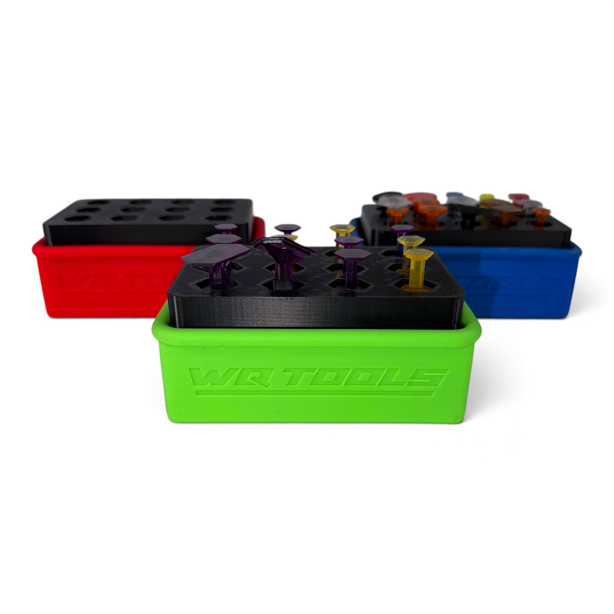 Anson PDR Dead Dent Tools Glory Hole tab holders in red, blue, and green, holding various hot glue tabs.