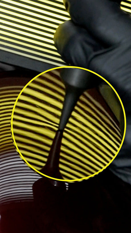 Anson PDR Dead Dent Tools Pee Wee ballistic knockdown tip being used on a car panel with a reflection board