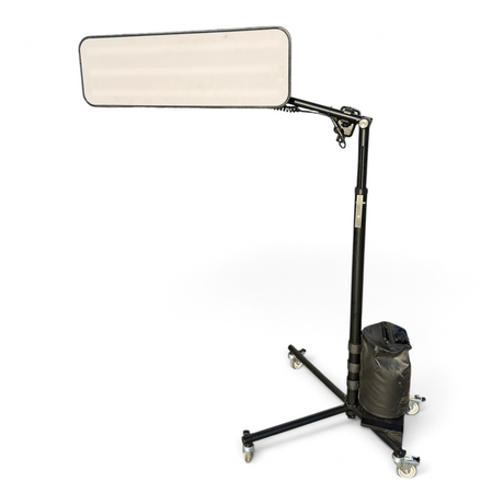 Anson PDR X Light Stand with Elimadent X-Factor PDR light, black rolling frame, and counterweight water bag.