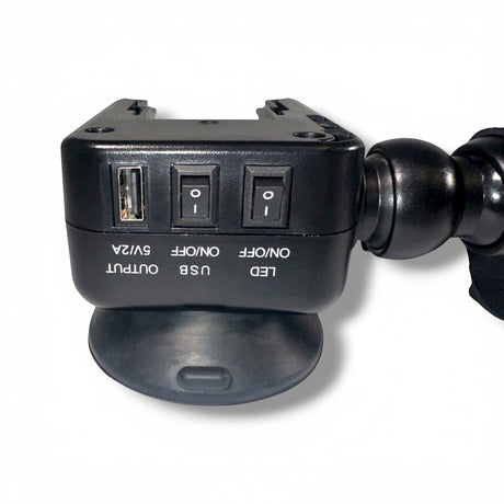 Anson PDR X-Factor Mini PDR light with USB output and LED on/off switches, black housing, and suction cup base.