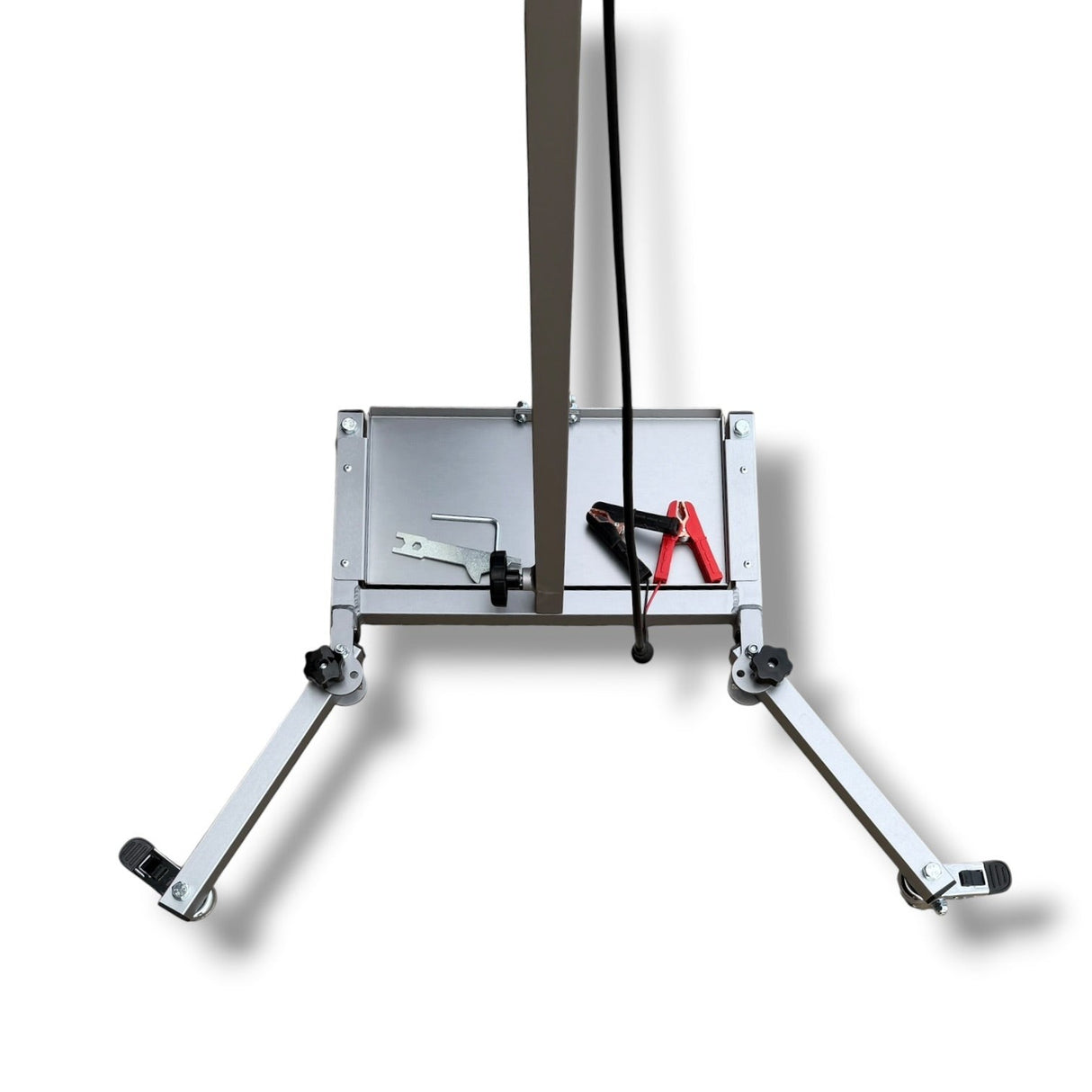 Anson PDR Econo Light Stand base with adjustable legs, battery tray, and cable clips. Silver aluminum construction.